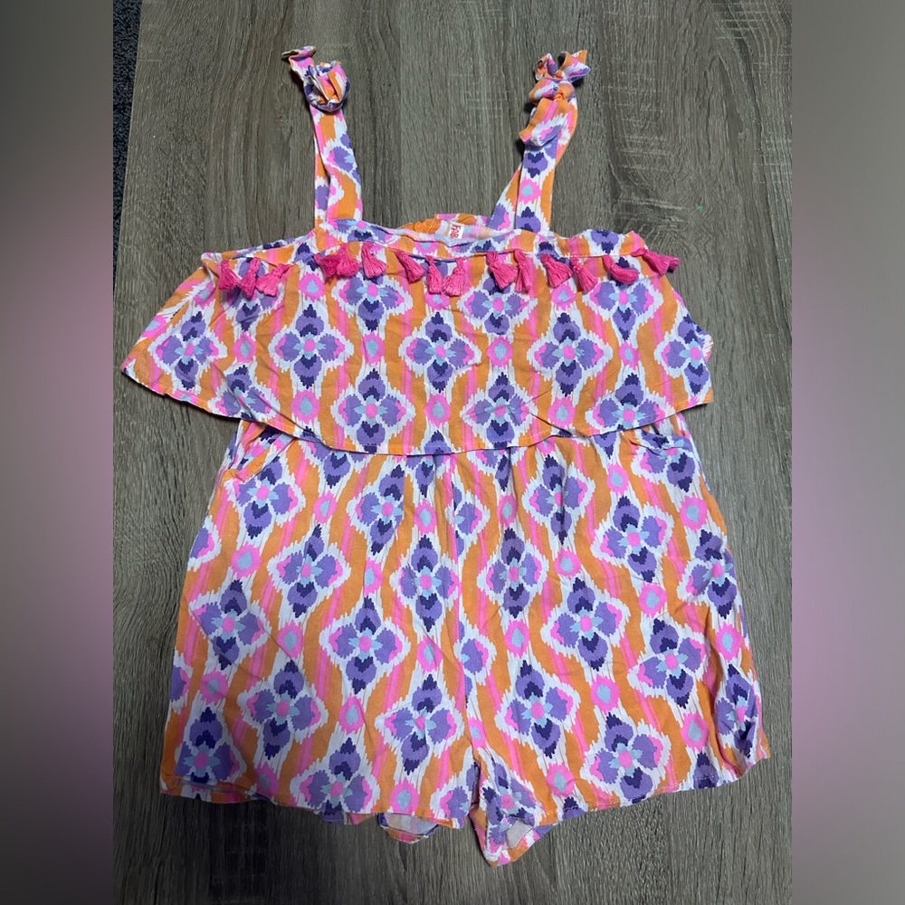 Girls vibrant shorts romper with pink pompom accents